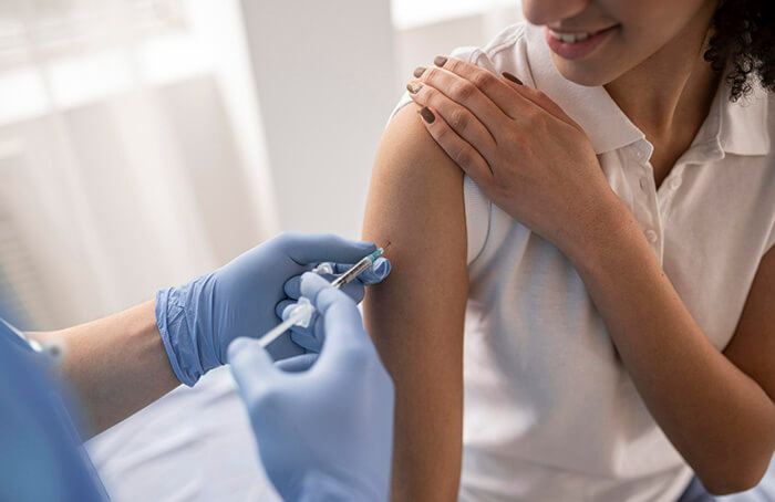 Vacunación contra virus de papiloma humano